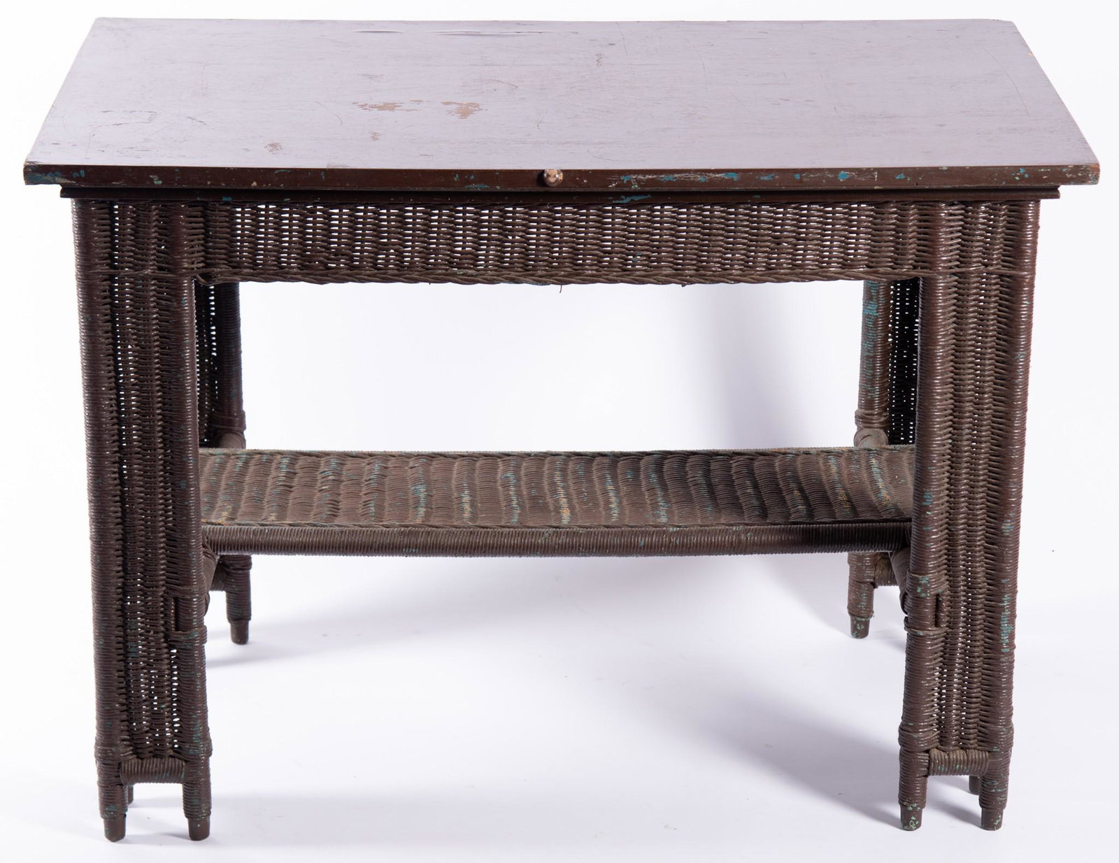 Arts & Crafts Wicker Table, Attributed to Gustave Stickley: Arts & Crafts Wicker Table, Attributed to Gustave Stickley Having a painted oak top with wicker legs and shelf. Height: 30 inches; top measures 26 x 42 inches