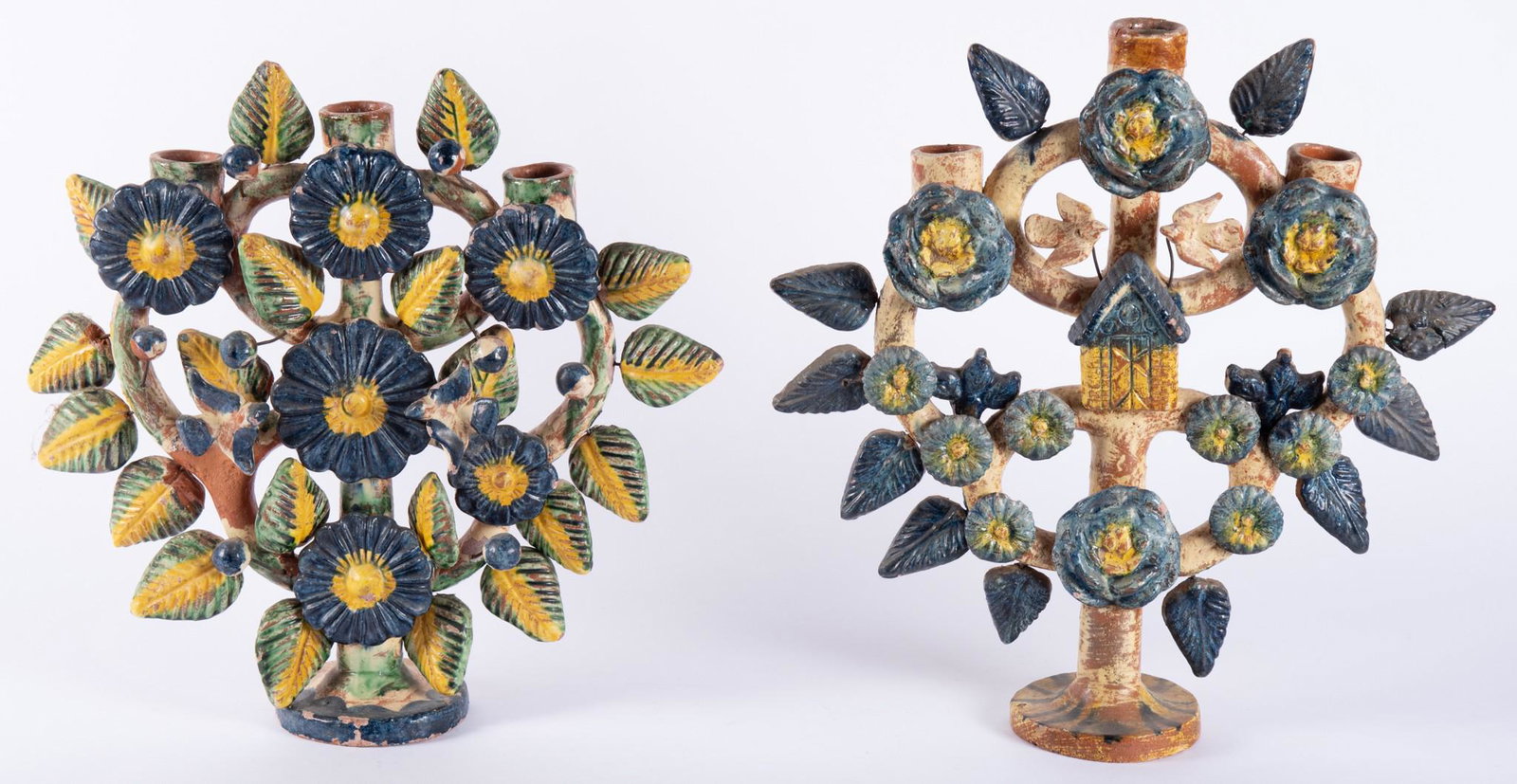 Antique Mexican Folk Art Candelabra: Antique Mexican Folk Art Candelabra each glazed in blue and gold morning glories One is 12 inches tall One is 13 1/2 inches tall
