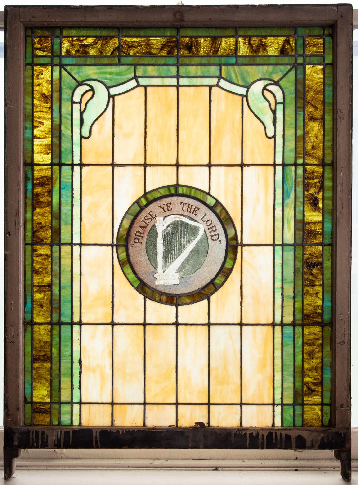 Antique Stained Glass Window: Antique Stained Glass Window Central medallion with a harp with green, blue and white panels. 52 x 38 inches