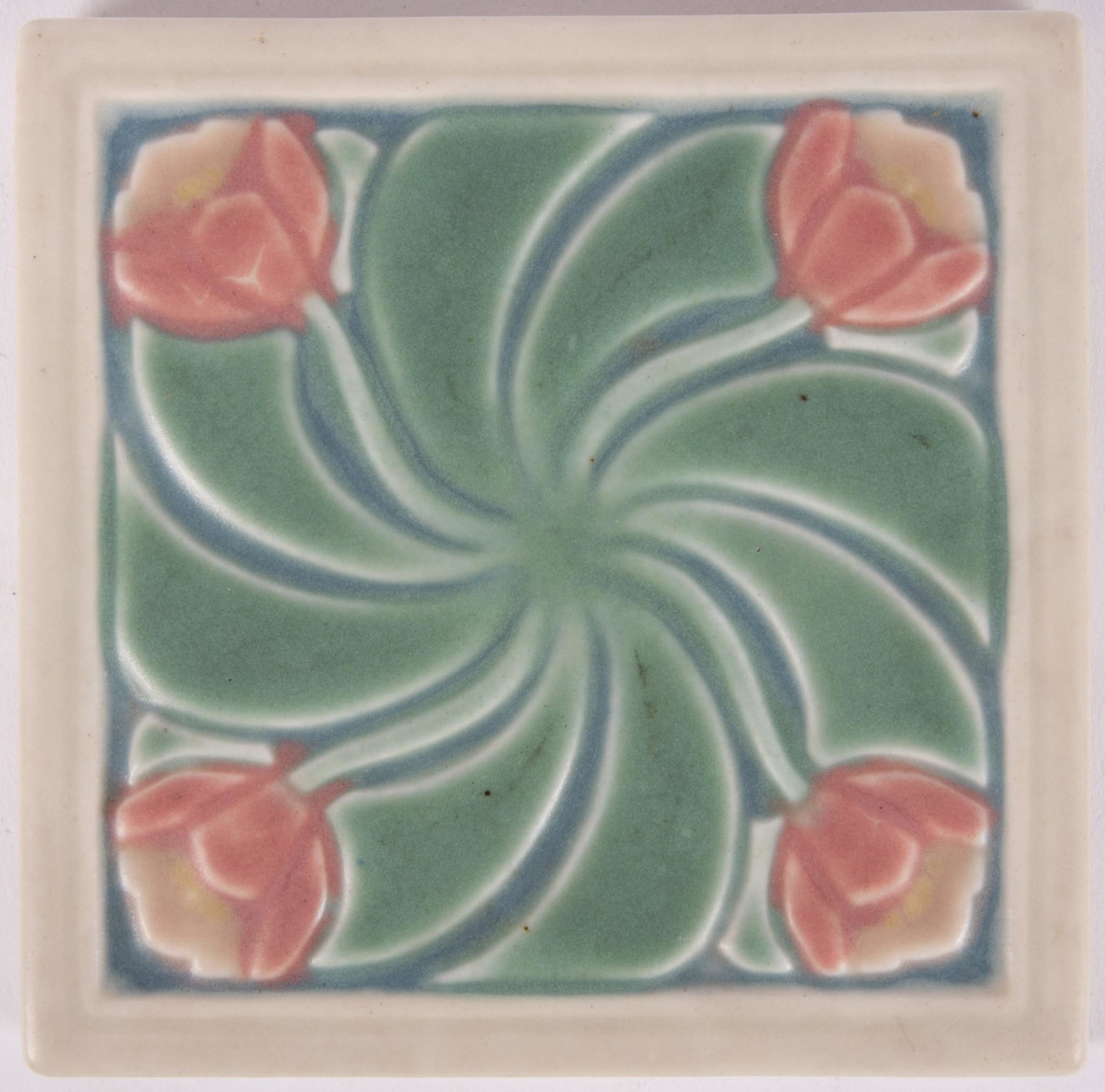 A 1921 Rookwood Pottery Trivet, Tulip Pattern: A 1921 Rookwood Pottery Trivet, Tulip Pattern Arts and Crafts stylized tulip pattern, dated 1921, numbered 1631 5 1/2"