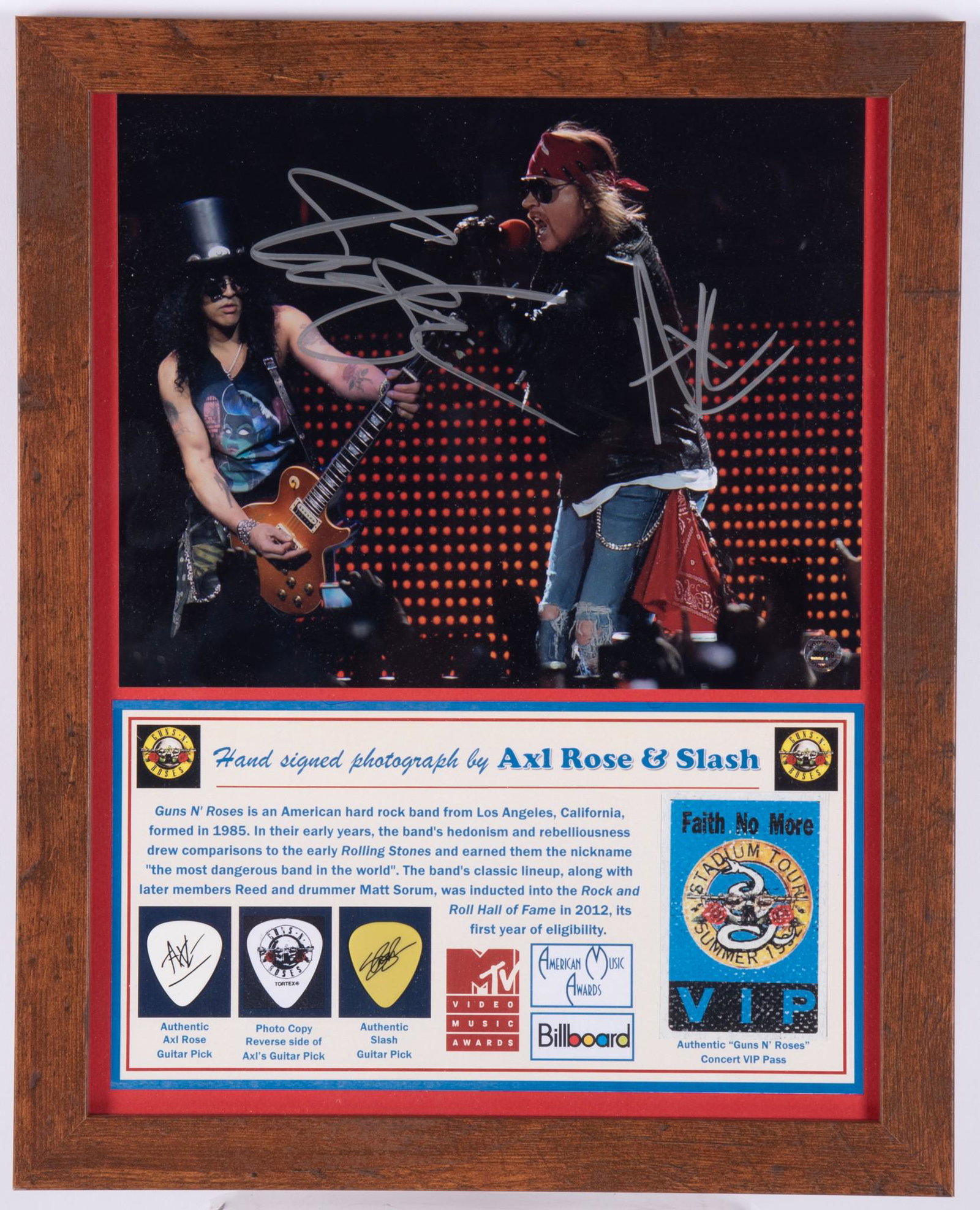 Gun's N' Roses Signed Photo/ Two Picks/ VIP Pass: Hand signed color photo by Axl Rose and "Slash" of Guns 'N Roses. They reminded everyone what Rock â€™N Roll was all about with their gritty, blues-influenced, hard rock sound and unique persona!