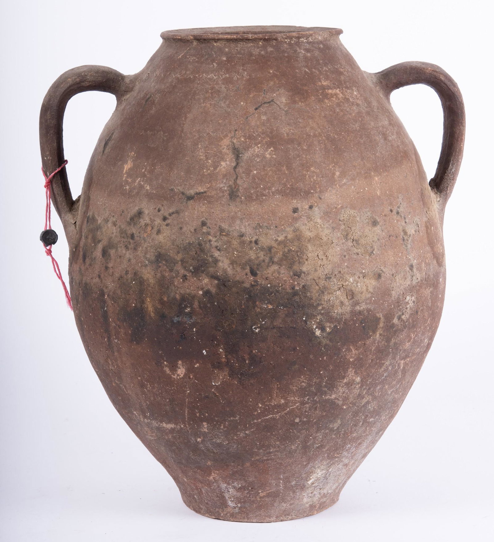 Byzantine Ceramic Amphora, circa 6th-10th Century: Byzantine Ceramic Amphora, circa 6th-10th Century 2 handled earthenware vessel, lightly embossed decoration to side. 15"