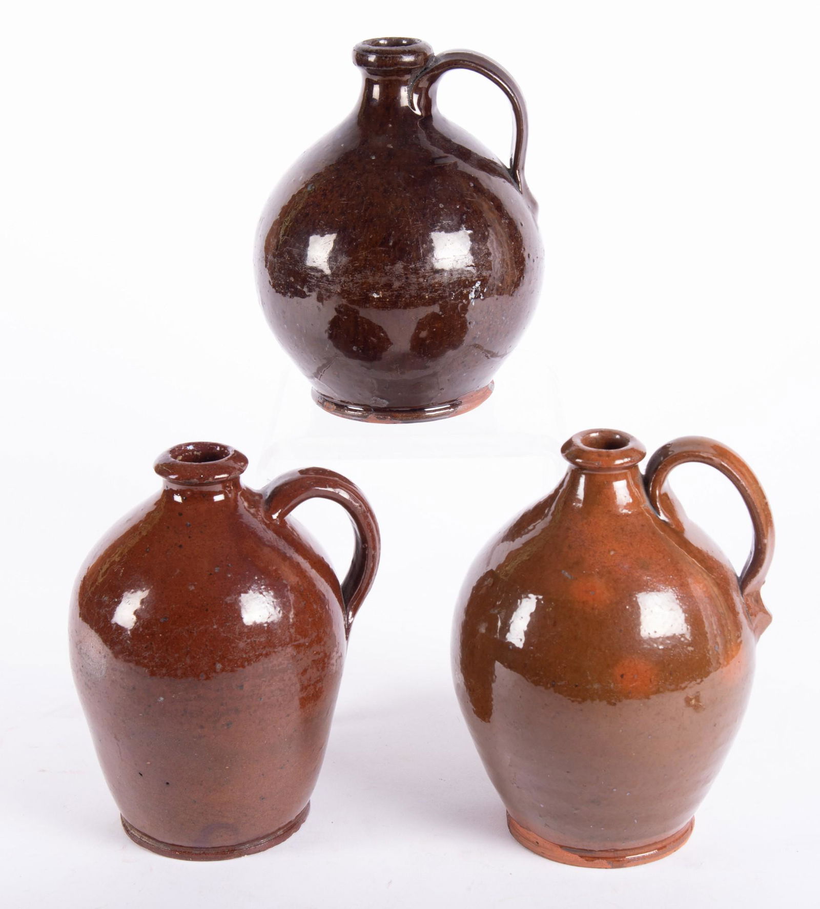 Three 19th Century Redware Ovoid Jugs (1 of 2)