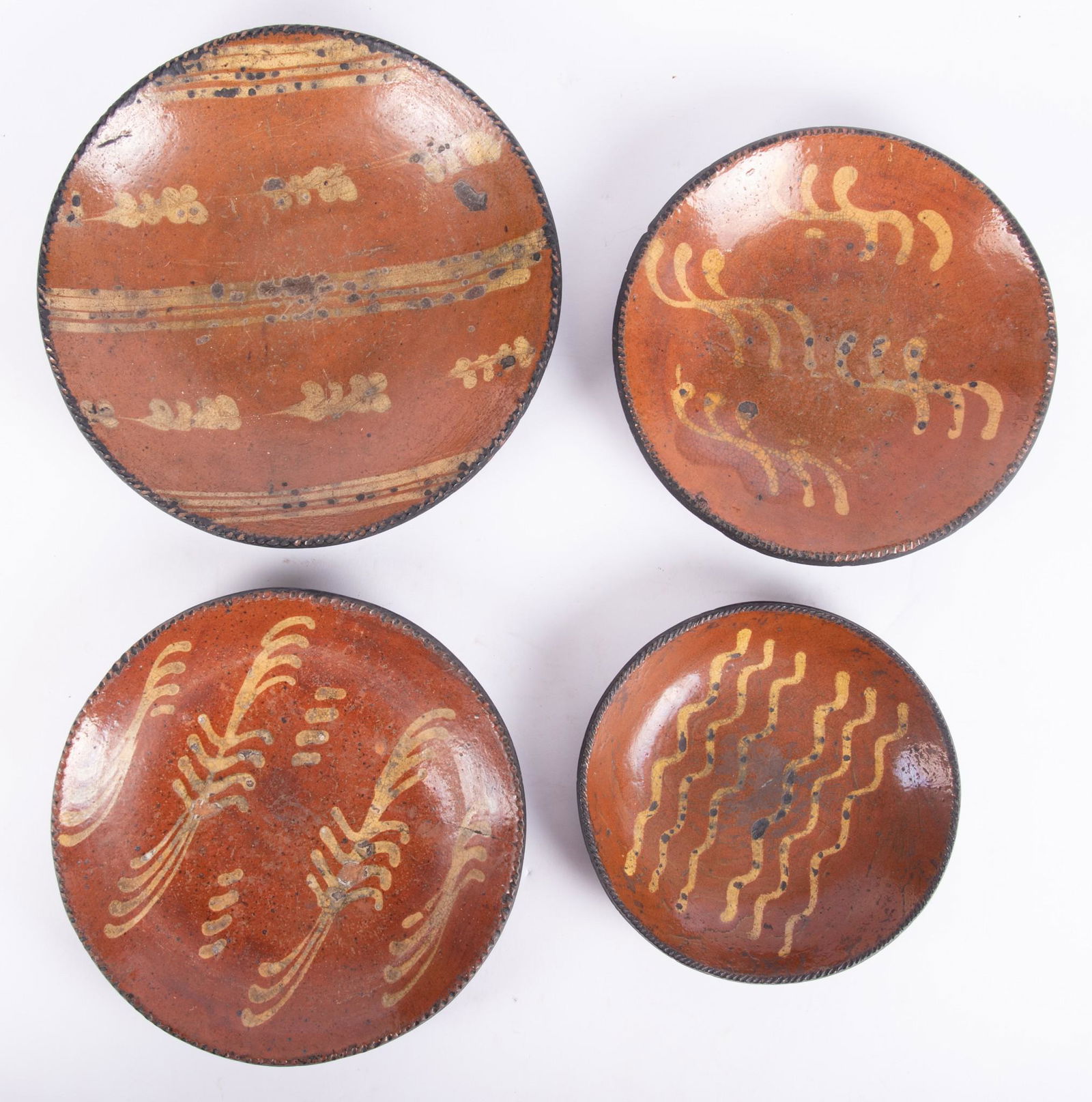 Four Slip Decorated American Redware Plates (1 of 4)