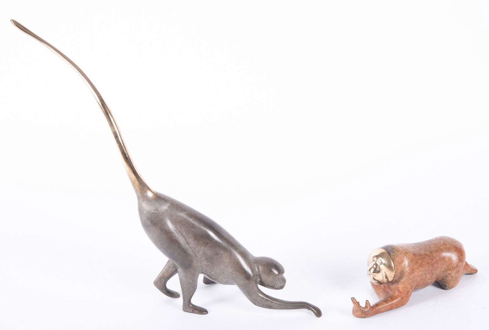 Loet Vanderveen, Dutch (1921-2015), Two Monkeys Reaching Forward, two bronze sculptures, ed. # (1 of 4)