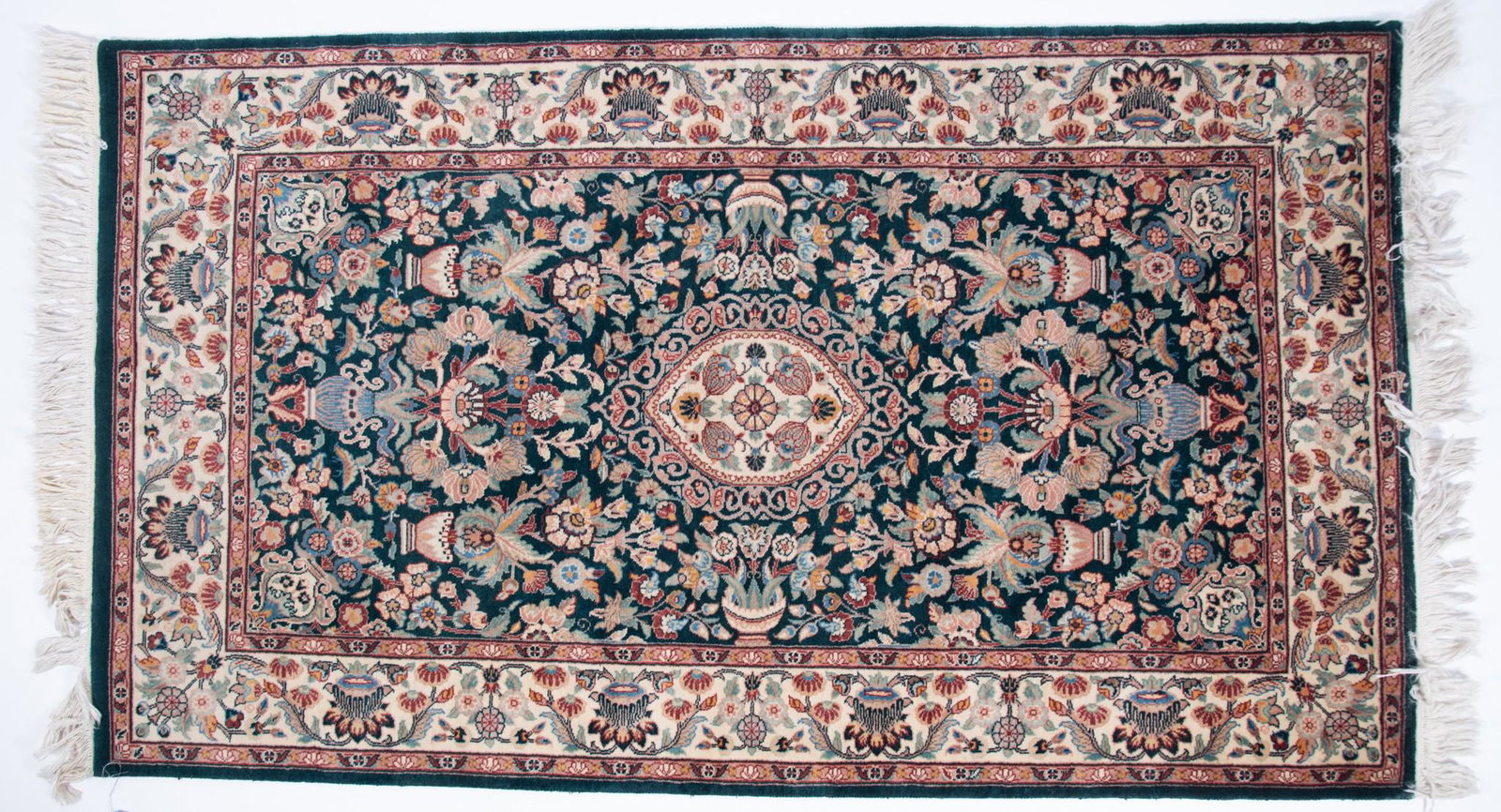 Handwoven Persian Area Rug: Handwoven Persian Area Rug Green field with all over urn and floral decoration centering an ivory floral border with an ivory primary border. 3' x 5' 4"