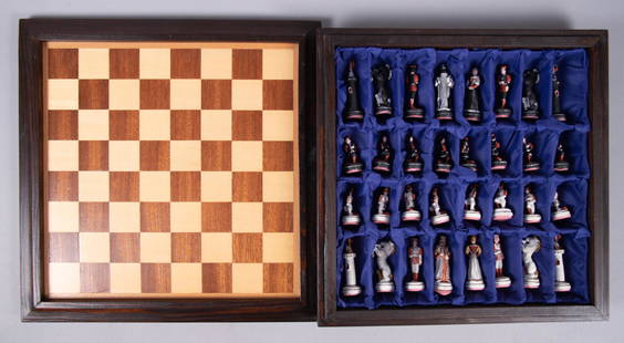 Medieval Royalty Metal Chess Set in Wood Case and Board: Medieval Royalty Metal Chess Set in Wood Case and BoardCharming chess set. Medieval Royalty Theme. Hand Painted. Cast-iron metal Chess Set in velvetlined wood case ~12" x 12" with board lid.