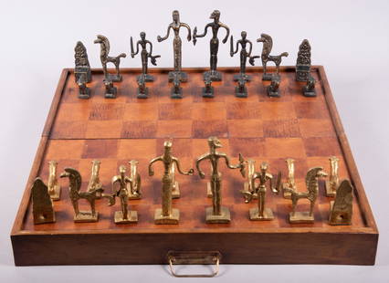 Large Cast Bronze/Brass Minoan Ancient Greek Chess Set: Large Cast Bronze/Brass Minoan Ancient Greek Chess SetRare. Handmade, by famous Greek-Crete artist Christoforus Sklavenitis in the Ninoan figurestradition of work of art, pawns as Minotaur. One side B