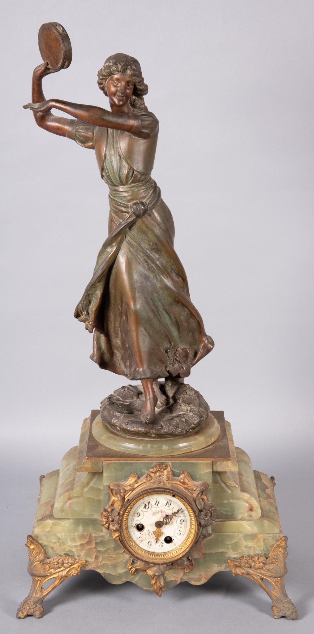 French Spelter and Onyx Figural Mantle Clock by “A.J. Scotte”: French Spelter and Onyx Figural Mantle Clock by “A.J. Scotte”Vintage French spelter figural mantle clock by A. J. Scotte, of a gypsy woman dancing and playing the tambourine. Mounted on a stepped