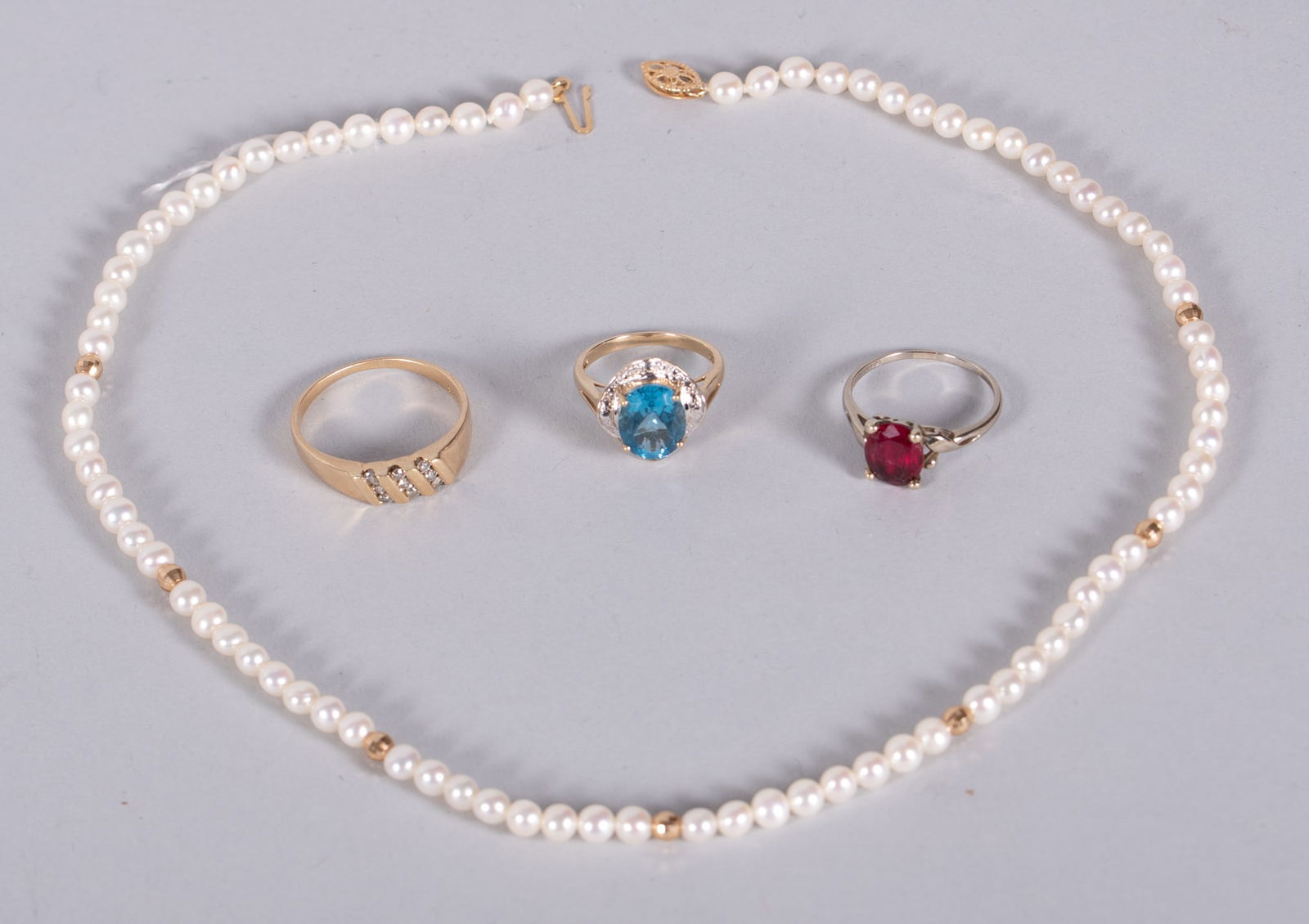 Three Gold Rings and a Cultured Pearl Necklace (1 of 2)