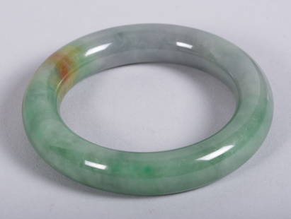 Chinese Jade Bangle Bracelet: Chinese Jade Bangle BraceletJade bangle measuring 13mm. Small size bracelet with mottled green color.