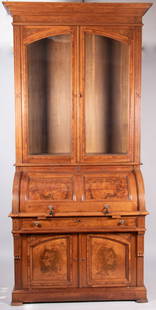 Antique American Victorian Walnut Two Member Secretary Bookcase: Antique American Victorian Walnut Two Member Secretary BookcaseStepped cornice above a pair of glazed doors. The bottom portion with roll top opening to a series of open compartments and a slide out w
