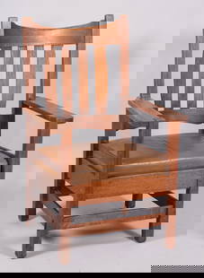 Attributed to Stickley Brothers Arts & Crafts Armchair: Attributed to Stickley Brothers Arts & Crafts ArmchairThe back with vertical slats centering a pair of thick paddle arms. Upholstered leather seat on top of slats.Seat height 17", seat depth 20&q