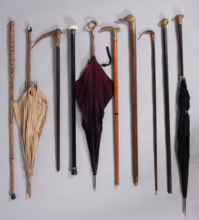 Collection Of Ten Antique/Vintage Canes And Umbrellas: Collection Of Ten Antique/Vintage Canes And UmbrellasThree umbrellas include one with bamboo handle and porcelain knob; seven canes include horn, duck, glass and brass handles.