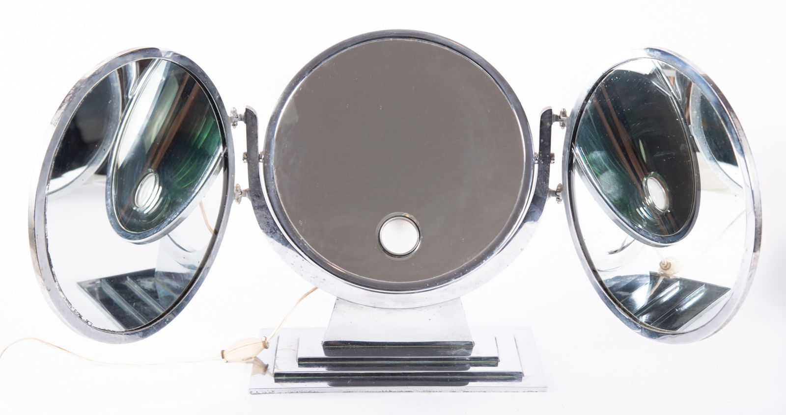 An Art Deco BROT Triptych Dressing Mirror, Paris: An Art Deco BROT Triptych Dressing Mirror, ParisA rarely found Art Deco, Art Moderne, three section mirror, with hinged side panels. Of substantial weight and quality, the mirror is all original, reta