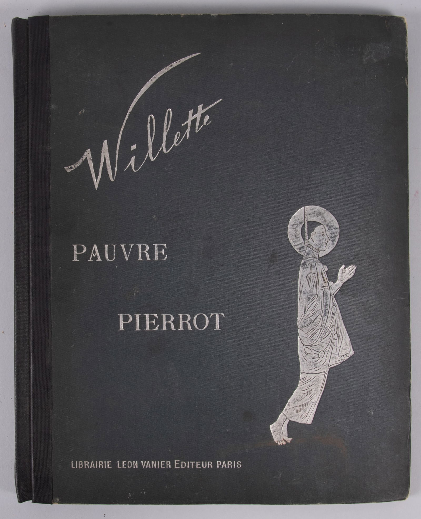 Pauvre Pierrot. Adolphe Leon Willette. 1st Edition. Paris: Leon Vanier, 1885.: Pauvre Pierrot. Adolphe Leon Willette. 1st Edition. Paris: Leon Vanier, 1885.Folio (35cm) edition of caricatures and text. Held in in publisher's blue boards with engraved vignette on upper cover. Reb
