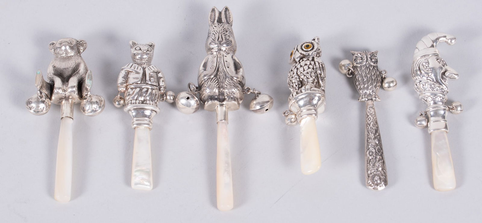 A Collection of Six Figural Sterling Silver Baby Rattles (1 of 5)