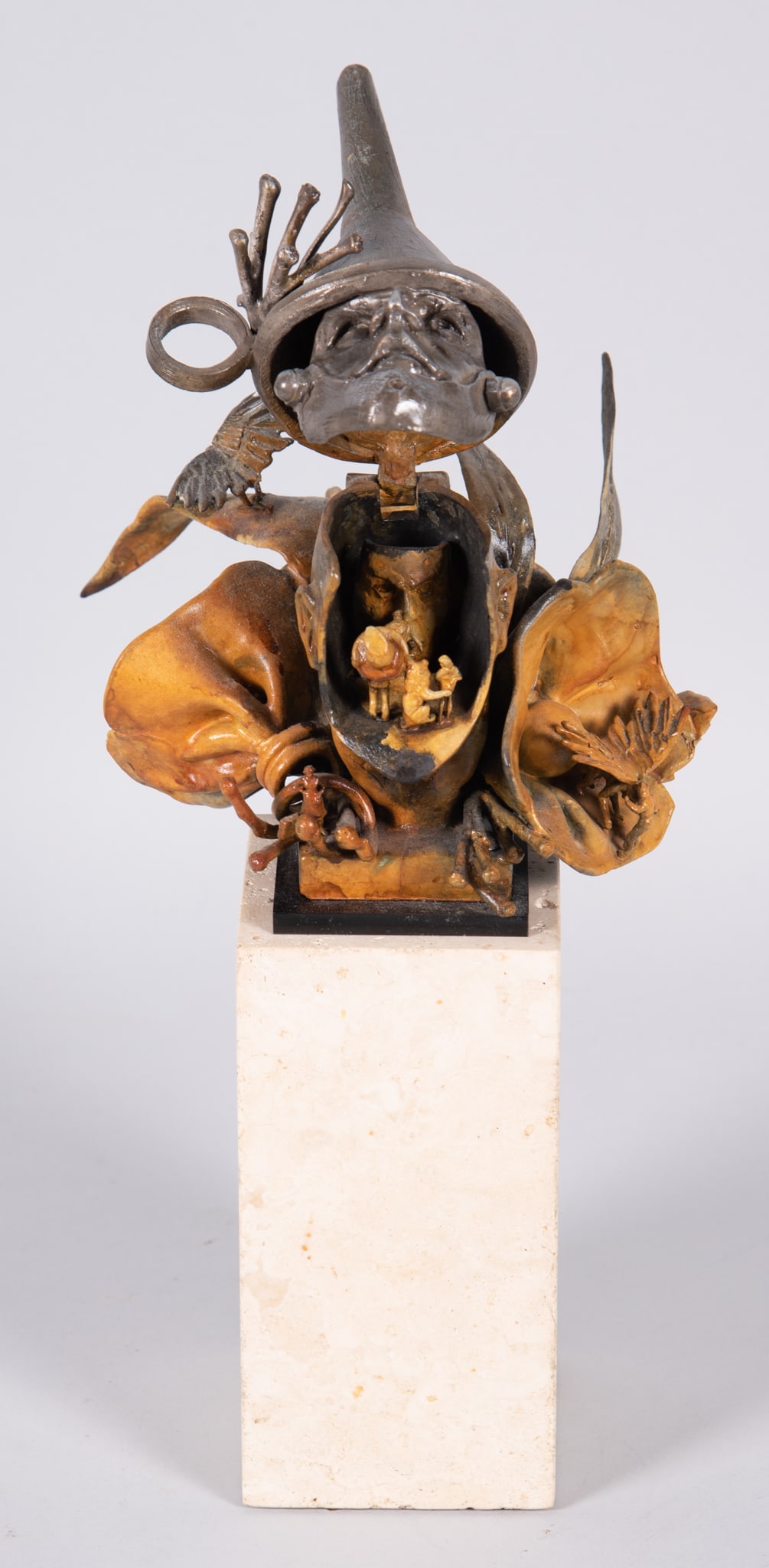 Theodore Gall, California/Illinois (b. 1941), Oz, Tin Man, bronze metamorphic sculpture: Theodore GallCalifornia/Illinois, (b. 1941)Oz, Tin Manbronze metamorphic sculptureTheodore Gall trained at the Art Institute of Chicago and has worked in animation, graphic design and sculptural works