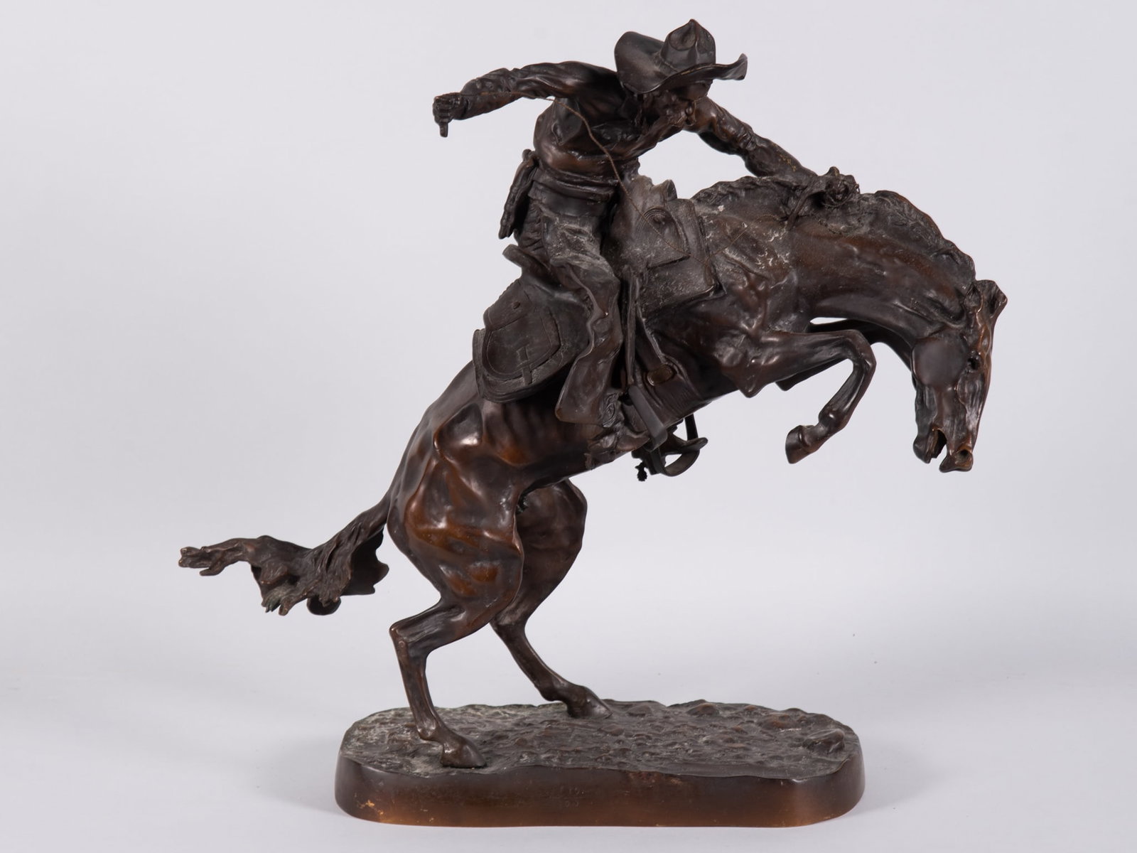 After Frederic Remington, Bronco Buster, Recast bronze sculpture (1 of 5)