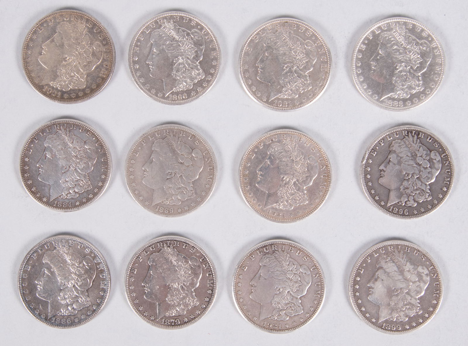 Morgan Dollars 12x (1879 S, 1883, 1884 S, 1886, 1889 O, 1890 O, 1896 O, 1899 O, two 1921S, 1921 D, (1 of 4)