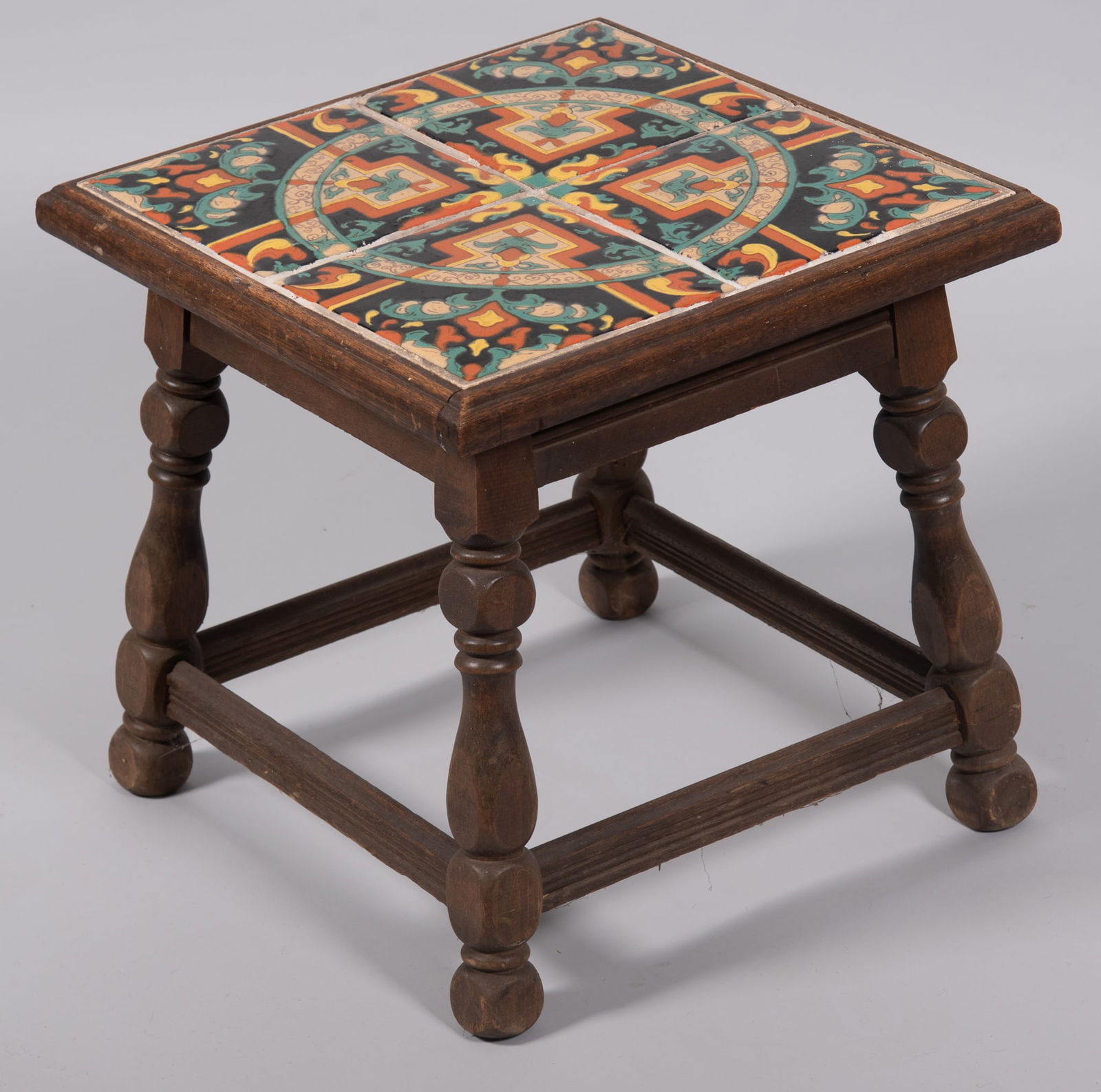 An Arts & Crafts California Tile Table, likely by Taylor Tile: An Arts & Crafts California Tile Table, likely by Taylor Tilemission style low table with four large tiles (one tile cracked), likely made by the Taylor Tile company. 18 inch square top, 17 3/4 inch h
