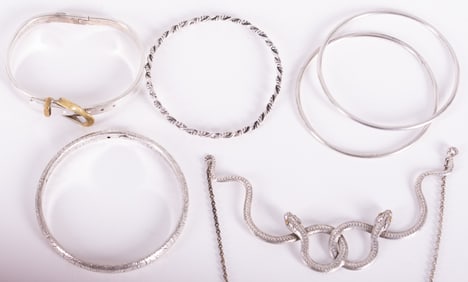 Five Sterling Silver Bangle Bracelets; together with Double Snake Necklace