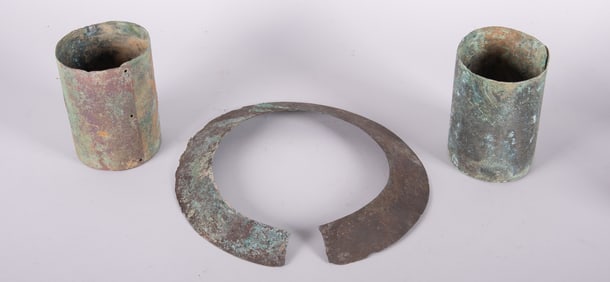 A Pair of Copper Trade Armbands and a Necklace