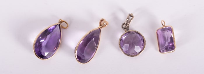 Four Amethyst Pendants