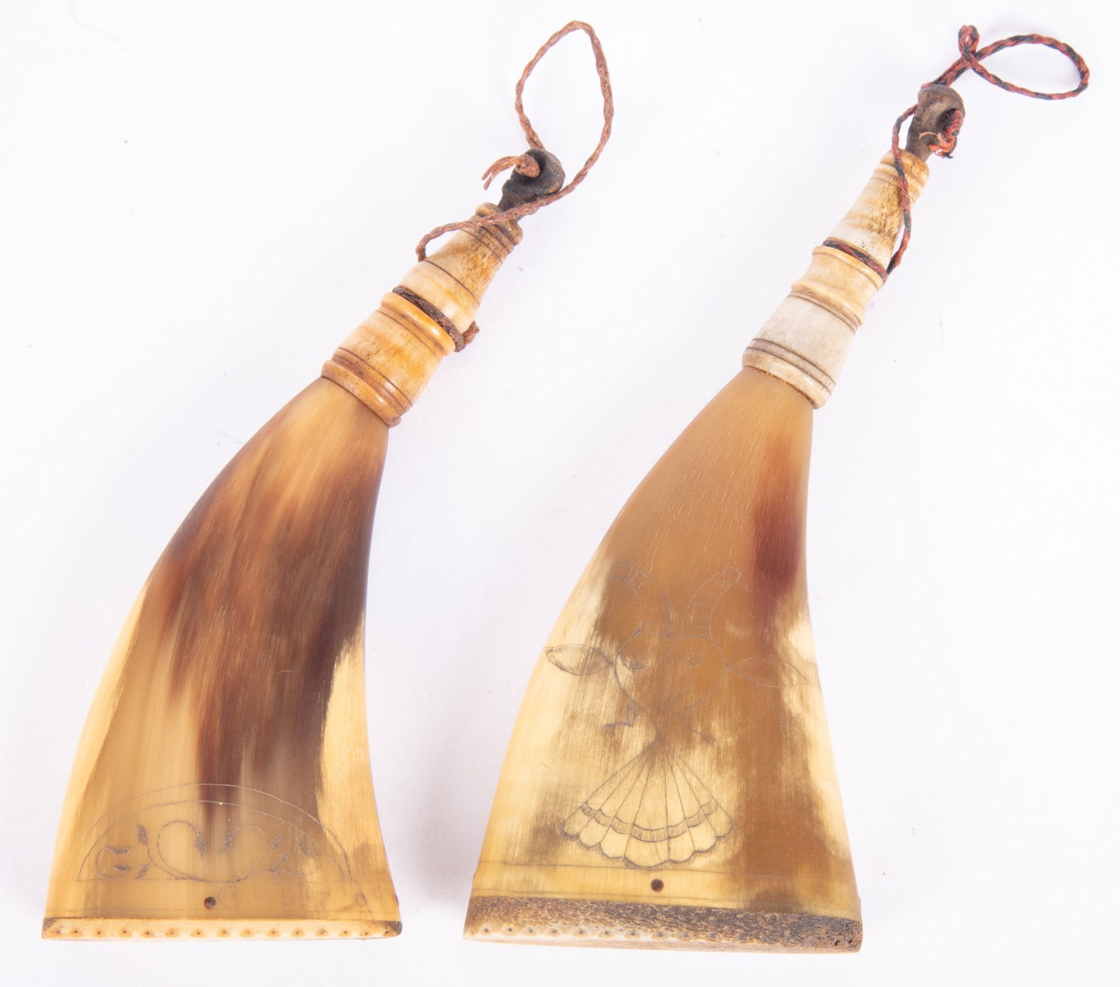 Pair of Flattened Horn Incised Decorated Flasks: Pair of Flattened Horn Incised Decorated Flaskswith stoppers.5 1/2 inches