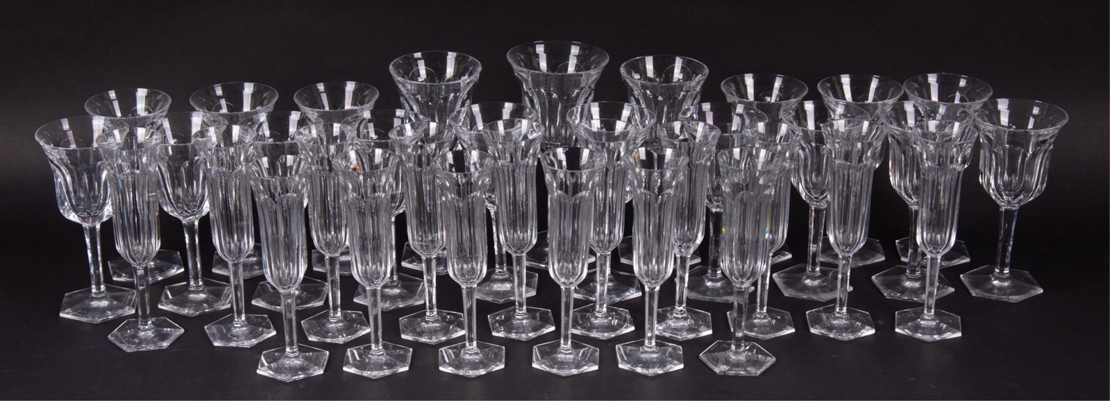 Collection of Baccarat Crystal Stemware, Malmaison: Collection of Baccarat Crystal Stemware, Malmaison An assortment of signed Baccarat Malmaison pattern stemware including 3 water goblets (8 inches, two have been heavily ground down); 16 wine goblets 