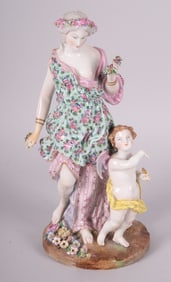 A Meissen Porcelain Figure Group, Woman with Cupid