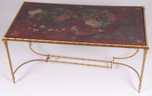 Attributed to Maison Bagues, Lacquered Coffee Table: Attributed to Maison Bagues, Lacquered Coffee TableWith gilt-metal Bamboo motif frame, and Chinoiserie decorated lacquered top with floral and bird design. Missing a bolt at the stretcher.Height: 17 i