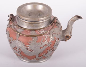 A Chinese Yixing Pottery Teapot with Pewter Dragon Overlay