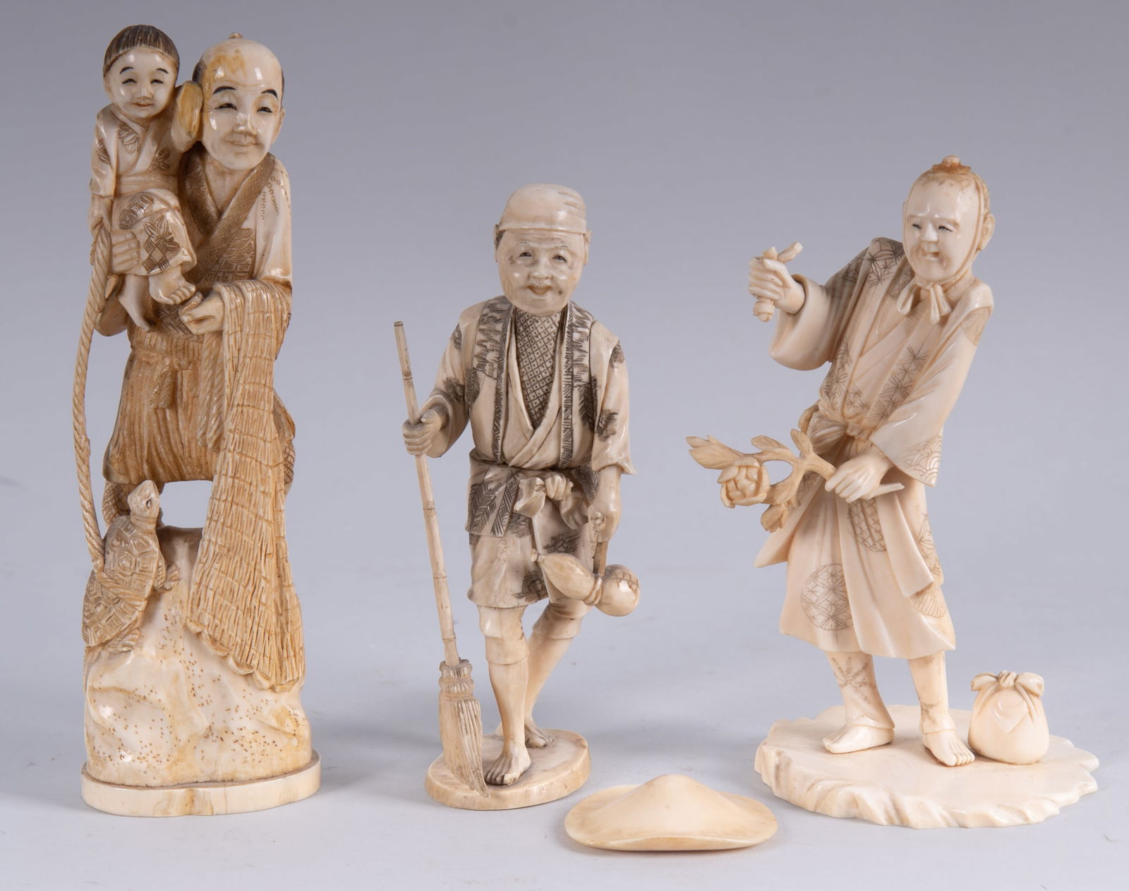 A Collection of Three Japanese Carved Okimono