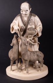 A Carved Japanese Figural Group