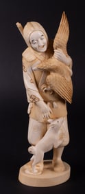 A Japanese Carved Bone Figure of a Hunter