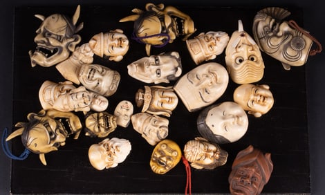 A Collection of Carved Japanese Miniature Masks