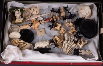 A Large Grouping of Asian Carved Bone Objects