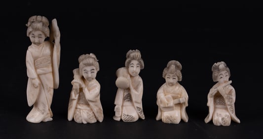 A Grouping of Japanese Carved Okimono of Musicians