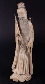 A Chinese Carved Figure of a Warrior