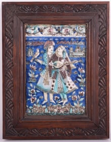 A Qajar Molded and Painted Pottery Tile