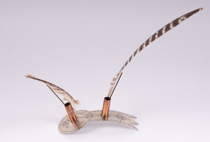 Roach Spreader and Two Feathers