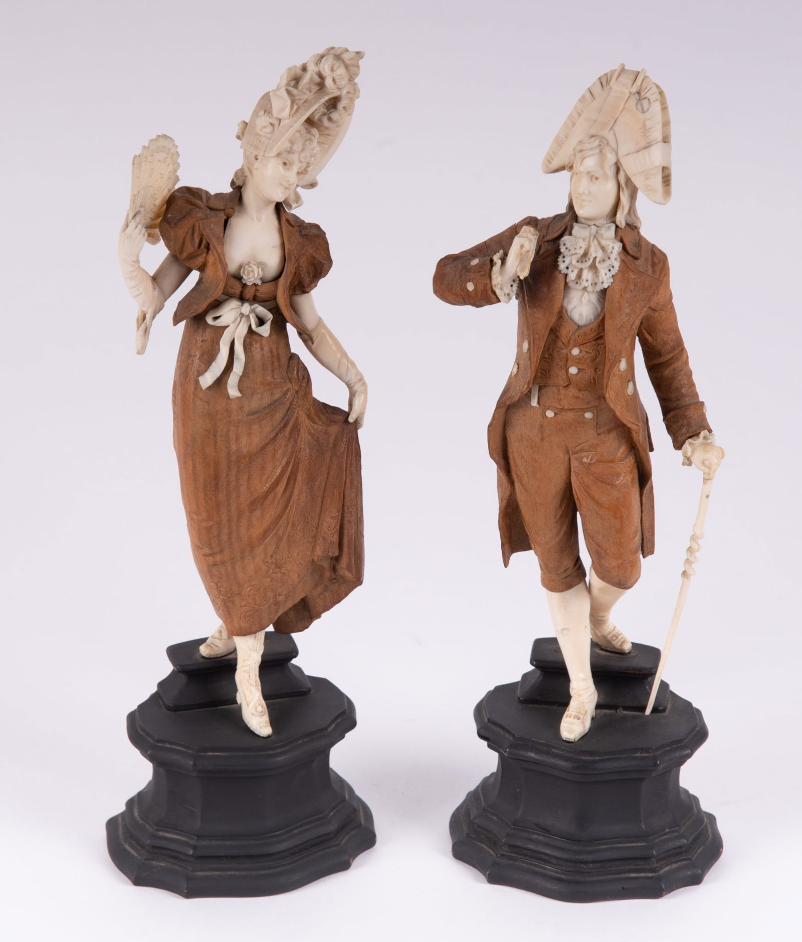 A Pair of French Carved Wood and Bone Figures, 19th Century: A Pair of French Carved Wood and Bone Figures, 19th Century France, 19th century, a finely detailed pair of courting figures, the base and bodies of carved wood, the legs, hands and head of carved bon
