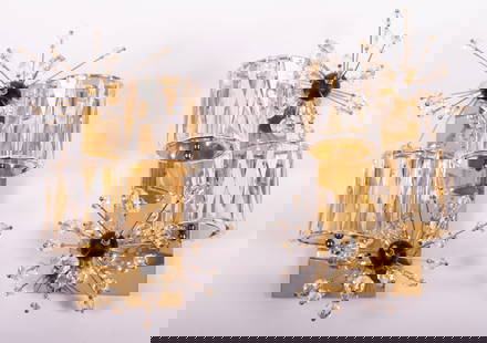 A Pair of Lobmeyr Donhauser 2-Light Sconces, J & L Lobmeyr Werkstatte, Vienna: A Pair of Lobmeyr Donhauser 2-Light Sconces, J & L Lobmeyr Werkstatte, ViennaSputnik style starbursts of crystal beads surround rounds of Swarovski hand cut crystal shades. The sconce is made of nicke