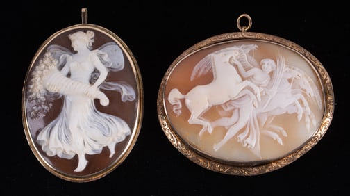 Two Unusual Cameos Set in Gold