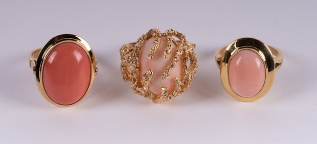 Collection of Coral Rings set in Yellow Gold