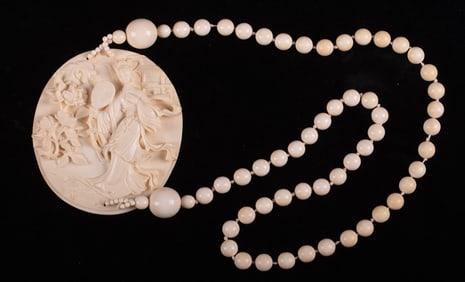 Necklace Featuring Carved Bone Medallion of a Geisha