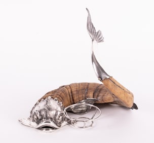 An Antique Sterling Silver and Horn Dolphin Stand