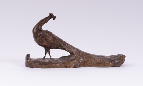 An Art Nouveau Bronze Peacock Sculpture
