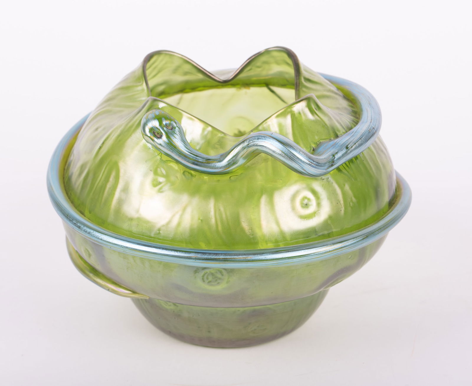 A Green Loetz Style Serpent Vase: A Green Loetz Style Serpent VaseAustrian, early 20th century, likely Loetz, a green iridescent art glass vase with a snake wrapped around the body of the vessel. Polished blown pontil.4 3/4 inches tal